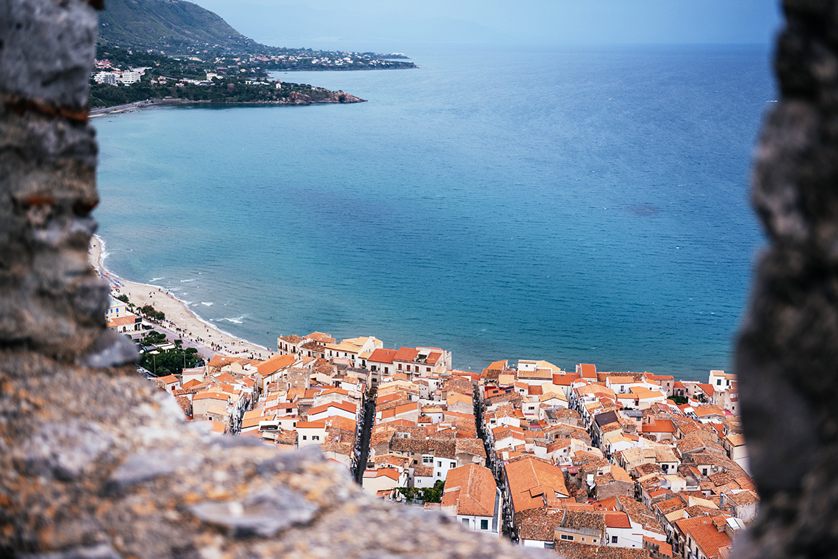 View of Cefalù’s old town and coastline from La Rocca park viewpoint in Sicil